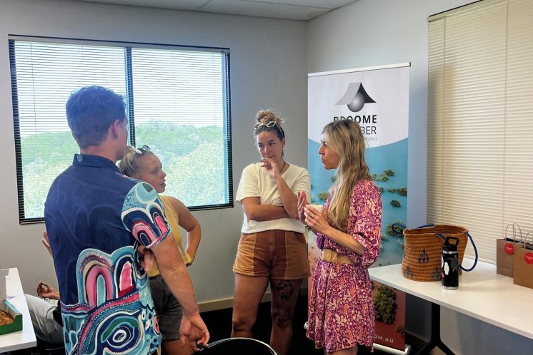 Image of Karen the Community of Practice Project Coordinator speaking to a group of support workers at one of the events.